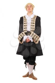 Young caucasian man wearing medieval costume and wig. Isolated on white