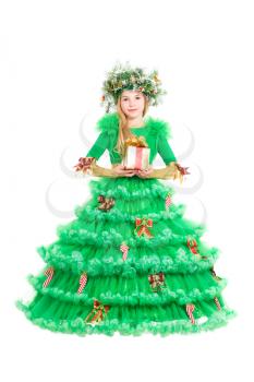 Little girl with present dressed in christmas tree costume. Isolated on white