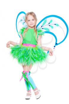 Smiling little blond girl showing her carnival costume. Isolated on white