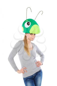 Pretty blond woman wearing grasshopper hat. Isolated on white