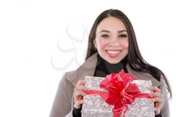 Portrait of pretty cheerful woman with a fancy box. Isolated on white
