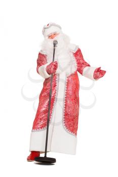 Santa Claus posing with a microphone. Isolated on white