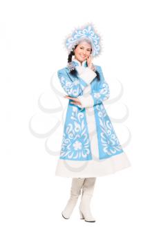 Nice brunette posing in a blue snow maiden costume. Isolated on white