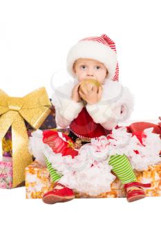 Pretty little girl wearing in Santa's helper costume. Isolated on white