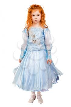 Nice redhead little girl posing in blue dress. Isolated on white