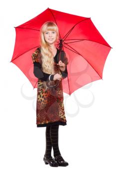 Little blond girl posing with red umbrella. Isolated on white