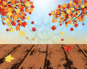 Autumn frame with maple leaves and grunge wooden table in perspective