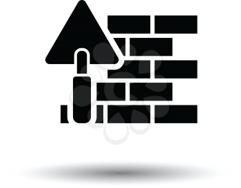 Icon of brick wall with trowel. White background with shadow design. Vector illustration.
