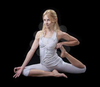 Royalty Free Photo of a Woman Practicing Yoga