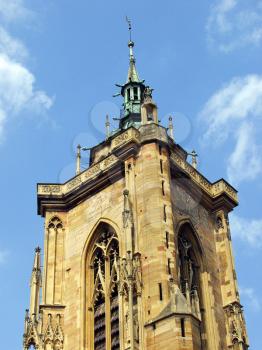 Royalty Free Photo of The Bell Tower of the Church in Colmar, France