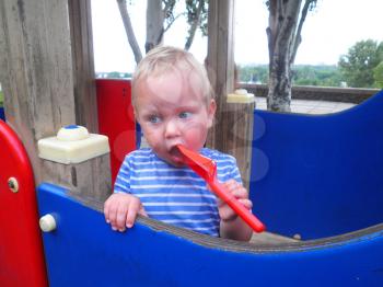Royalty Free Photo of a Little Boy Playing 