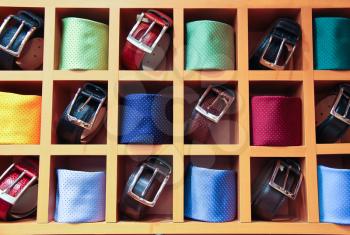Large selection of ties and belts on sale