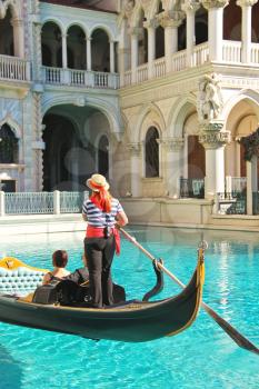 LAS VEGAS, NEVADA, USA - OCTOBER 20 : Gondola rides in Venetian  Hotel on October 20, 2013 in Las Vegas, The resort opened on May 3, 1999. One of the most luxurious hotels in Las Vegas