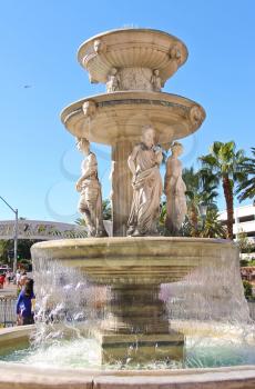 LAS VEGAS, NEVADA, USA - OCTOBER 20 : Italian-style fountain near  Venetian  Hotel on October 20, 2013 in Las Vegas, The resort opened on May 3, 1999. One of the most luxurious hotels in Las Vegas