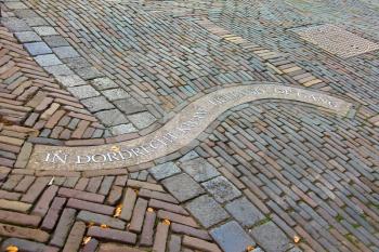 The inscription on the sidewalk in Dordrecht. Netherlands