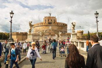 ROME, ITALY - MAY 03, 2014: People on the bridge of Castel Sant'Angelo in Rome, Italy