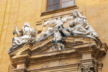 Sculpture composition on building of Court of Justice on Piazza San Firenze, Florence, Italy