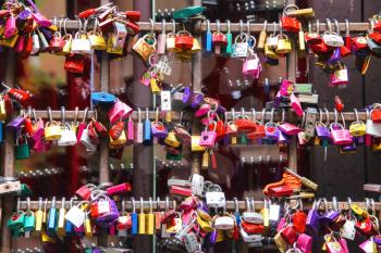 VERONA, ITALY - MAY 7, 2014: Many love locks on the gates of the Juliet house in Verona, Italy
