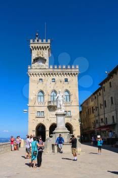 SAN MARINO. SAN MARINO REPUBLIC - AUGUST 08, 2014: Tourists near the Palazzo Pubblicco in San Marino. The Republic of San Marino