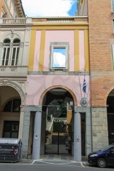 Bologna, Italy - August 18, 2014: Building Consulate of Greece in Italy. June 15, 2014 activists of Initiative for freedom of movement and the right to choose, was captured and occupied by this Cons
