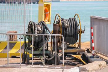 Dock equipment at the berth in Piombino seaport, Italy