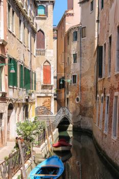 Empty gondola on canal of Venice, Italy