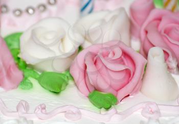 Royalty Free Photo of an Icing Rose on a Cake