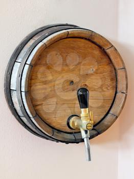 Royalty Free Photo of a Wooden Barrel With a Tap