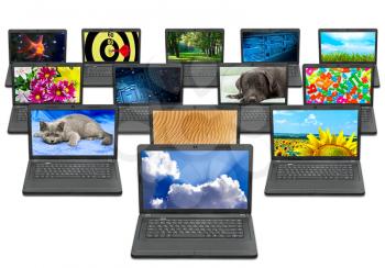 many laptops with different pictures on the screen isolated on white background