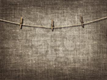 Royalty Free Photo of a Clothesline With Pins