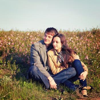 Outdoor Portrait of young couple against the sky