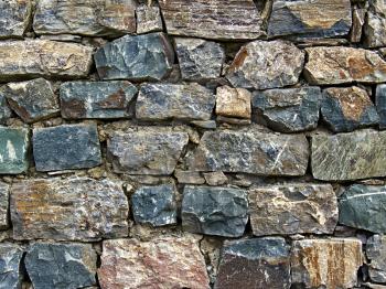 wall of rough stones in the background