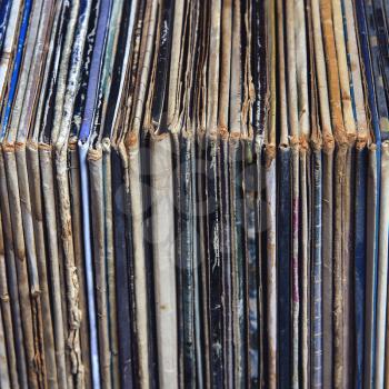stack of vinyl records in envelopes