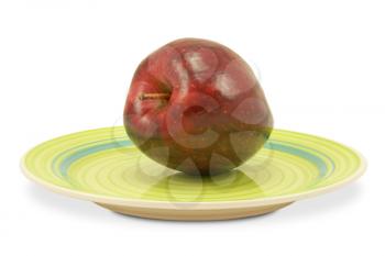 Royalty Free Photo of an Apple on a Plate