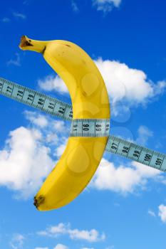 Royalty Free Photo of a Banana in the Sky
