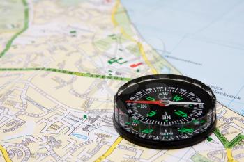 Royalty Free Photo of a Compass on a Map