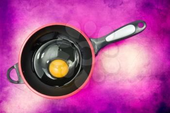 Royalty Free Photo of an Egg on a Frying Pan