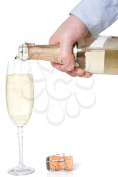 Royalty Free Photo of a Person Pouring Champagne