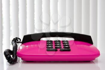 Royalty Free Photo of a Pink Telephone