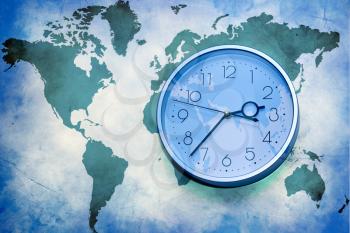 Royalty Free Photo of a Clock on a World Map