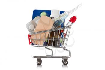Shopping cart with pills and medical supplies. Isolated on white background