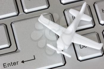 Royalty Free Photo of a Plane on a Keyboard