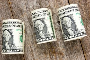 Royalty Free Photo of American Bills on a Wooden Table
