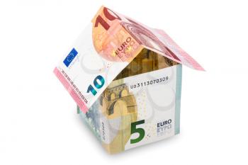 House made of euro money, isolated on white background