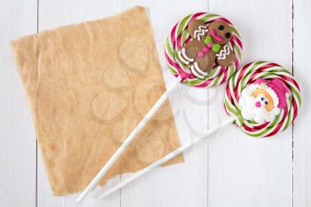 Christmas and New year sweets with blank paper for copy-space