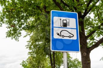 Electric car charging station road sign