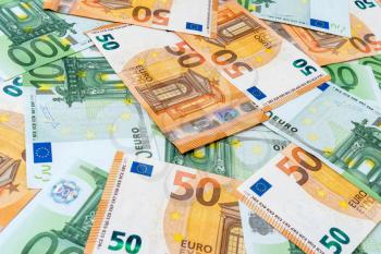 Background from fifty and one hundred Euro banknotes