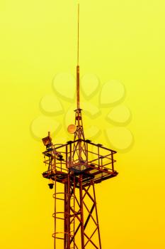 Antenna Tower of Communication on the orange sunset