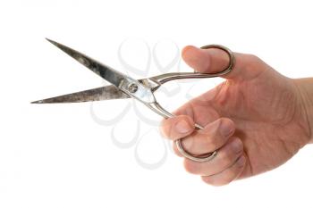 Hand holding a scissors isolated on white background