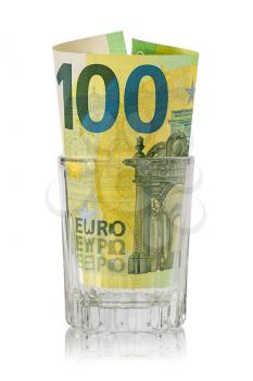 Glass for alcohol with one hundred Euro inside. Money lost through alcohol addiction